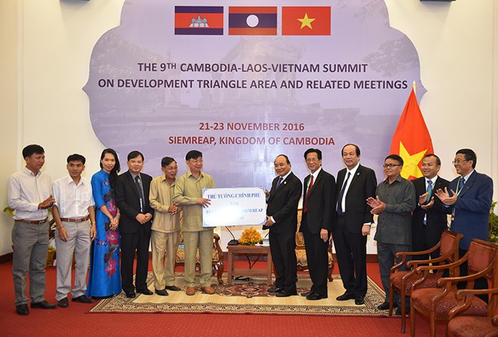 Prime Ministers of Vietnam, Lao meet - ảnh 2